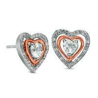 Goldia Earrings 40mm LabCreated White Sapphire and Diamond Accent Heart Stud Earrings in Sterling Silver and 10K Rose Gold Goldia Earrings 40mm LabCreated White Sapphire and Diamond Accent Heart Stud Earrings in Sterling Silver and 10K Rose Gold