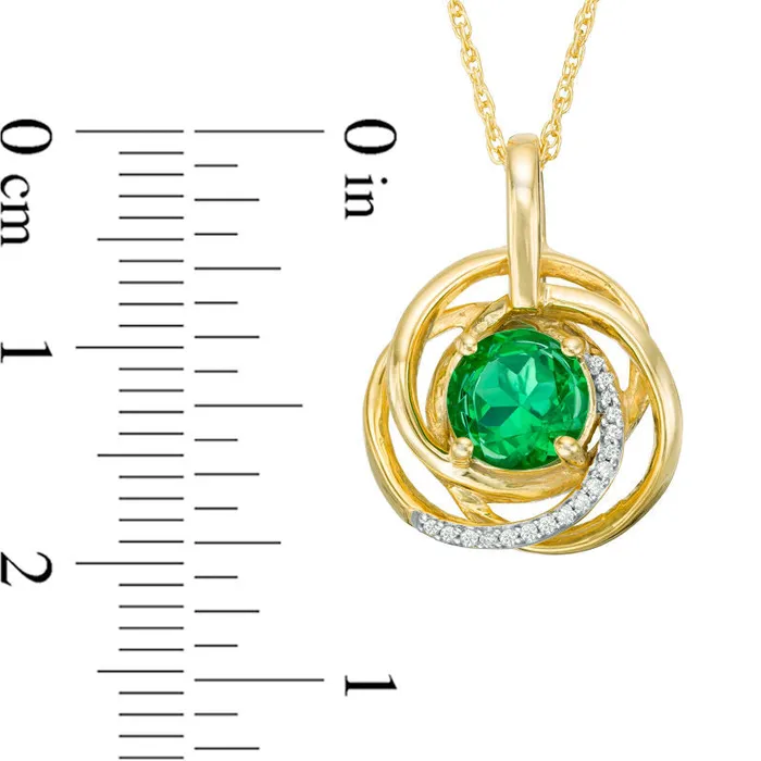 Goldia Necklaces 70mm LabCreated Emerald and Diamond Accent Love Knot Pendant in 10K Yellow Gold Goldia Necklaces 70mm LabCreated Emerald and Diamond Accent Love Knot Pendant in 10K Yellow Gold