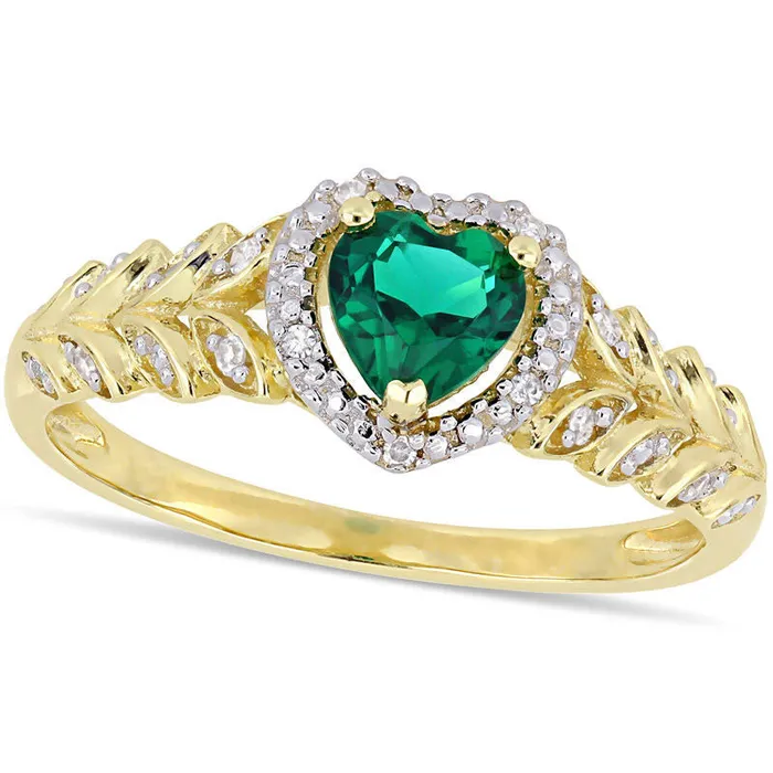 Goldia Rings 50mm HeartShaped LabCreated Emerald and 005 CT TW Diamond Beaded Frame Leaf Shank Ring in Solid 10K Yellow Gold Goldia Rings 50mm HeartShaped LabCreated Emerald and 005 CT TW Diamond Beaded Frame Leaf Shank Ring in Solid 10K Yellow Gold