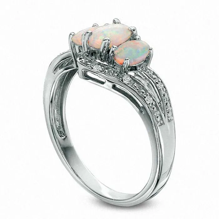 Goldia Rings Oval LabCreated Opal and White Sapphire Three Stone Bypass Ring in Sterling Silver Goldia Rings Oval LabCreated Opal and White Sapphire Three Stone Bypass Ring in Sterling Silver
