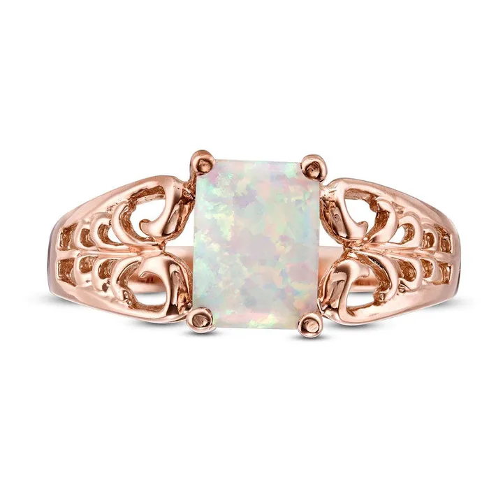 Rings EmeraldCut LabCreated Opal Open Scroll Ring in Solid 10K Rose Gold Goldia Rings EmeraldCut LabCreated Opal Open Scroll Ring in Solid 10K Rose Gold Goldia